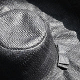 Chapeau artisanal Capeline noir fait main à Madagascar, en fibres naturelles. Style authentique, léger et parfait pour l’été.