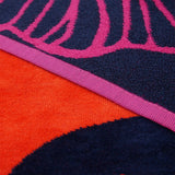 Serviette de plage Tropical forest XL éponge velours Jacquard Rose 140x180 400g/m² douce, absorbante et idéale pour plage et piscine.