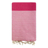 fouta traditionnelle nid d’abeille mikanda fuchsia 100x200 cm ou 200x200 100 % coton 190 g/m², absorbante, légère et peu encombrante pour la plage ou la maison. Se transforme en paréo