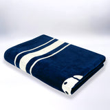 serviette de plage éponge velours jacquard sistelo bleu 90x170 cm 400g/m² douce et absorbante, idéale piscine, plage ou salle de bain.