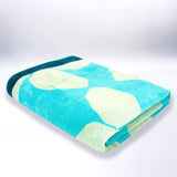 serviette de plage freestyle XL éponge velours jacquard bleu 140x180 cm 400g/m² douce, absorbante et idéale pour plage et piscine.