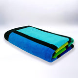 serviette de plage éponge velours jacquard happy men taille L 100x175cm 100% coton, 470 g/m², douce, absorbante et coordonnée, idéale pour plage ou piscine.