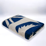 serviette de plage éponge velours jacquard likoma beige 90x170 cm douce et absorbante, idéale piscine, plage ou salle de bain.