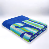serviette de plage nyaralas XL éponge velours jacquard 140x180 cm 400g/m², douce et très absorbante, idéale plage et piscine ou pique-nique.