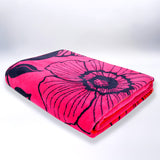 serviette de plage XL éponge velours jacquard rose 140x180 400g/m² douce, absorbante et idéale pour plage et piscine.