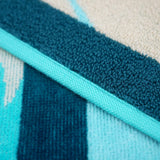 zoom serviette de plage éponge velours Jacquard Miyako Bleu 90x170cm 400g/m² douce et absorbante, idéale piscine, plage ou salle de bain