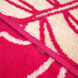 zoom serviette de plage éponge velours Jacquard Colca Rose 90x170 cm 400g/m², douce et absorbante, idéale piscine, plage ou salle de bain.
