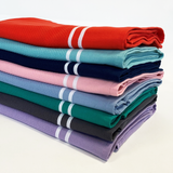 Fouta coton doublée éponge Waffle 90x170cm 100% coton 355gm², double face éponge, absorbante et compacte. Idéale plage, piscine ou salle de bain.