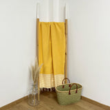 fouta traditionnelle nid d’abeille mikanda tournesol 100x200 cm ou 200x200 cm 100 % coton 190 g/m², absorbante, légère et peu encombrante pour la plage ou la maison. Se transforme en paréo.