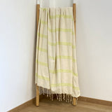 fouta plate traditionnelle calliope lime 100x200 cm ou 200x200cm coton 190 g/m², absorbante, légère et peu encombrante pour la plage ou la maison. se transforme en paréo