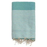 fouta traditionnelle nid d’abeille mikanda aqua 100x200 cm ou 200x200 cm 100 % coton 190 g/m², absorbante, légère et peu encombrante pour la plage ou la maison. Se transforme en paréo