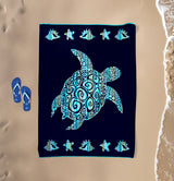 Serviette de plage Calypso XL éponge velours Jacquard Bleu 140x180 cm 400g/m² douce et très absorbante, idéale plage et piscine ou pique-nique.