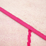 zoom serviette de plage éponge velours Jacquard Tunga Rose 90x170cm 400g/m² douce et absorbante, idéale piscine, plage ou salle de bain.