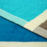 zoom serviette de plage XL éponge velours jacquard Bleu cabrera 140x180 400g/m² douce, absorbante et idéale pour plage et piscine.