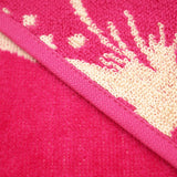 zoom serviette de plage éponge velours jacquard flora rose 90x170 cm 400g/m² flora douce et absorbante, idéale piscine, plage ou salle de bain
