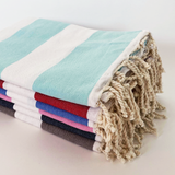 fouta plate traditionnelle transat 100x200 cm, coton 190 g/m², absorbante, légère et peu encombrante pour la plage ou la maison. Se transforme en paréo.
