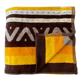 serviette de plage éponge velours jacquard macarena XL 140x180 cm en coton 400 g/m² douce et absorbante, idéale plage et piscine.